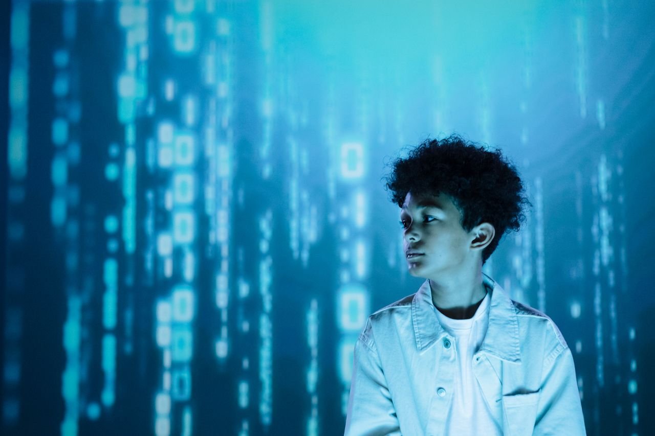 services-01 Teenager in a futuristic setting with digital effects. Conceptual and modern feel.